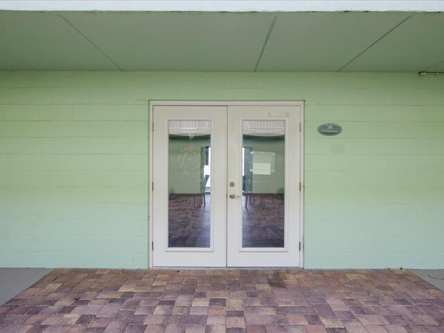 464 N Paula Dr Unit 106, Dunedin, FL 34698 - property entrance featuring french doors