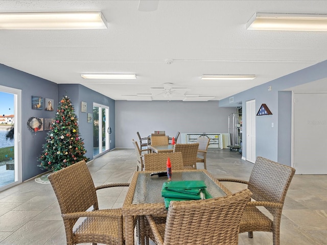 464 N Paula Dr Unit 106, Dunedin, FL 34698 - dining area with ceiling fan
