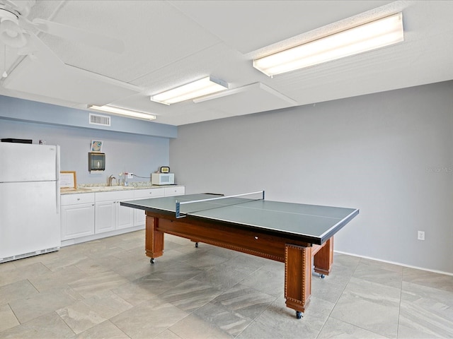 464 N Paula Dr Unit 106, Dunedin, FL 34698 - recreation room with a sink