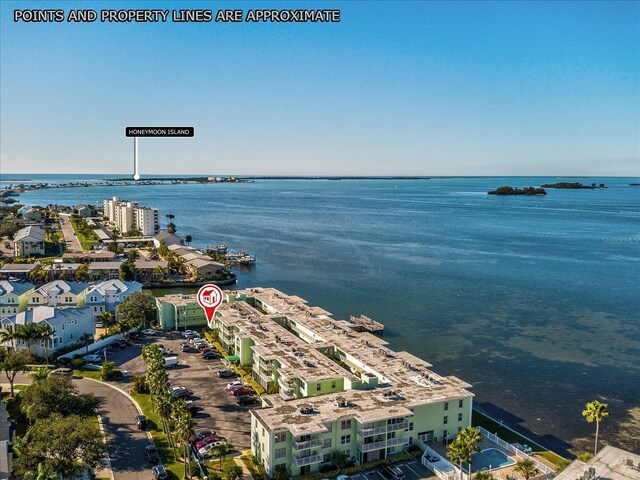 464 N Paula Dr Unit 106, Dunedin, FL 34698 - drone / aerial view of a large body of water