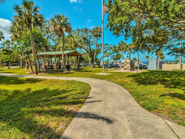 464 N Paula Dr Unit 106, Dunedin, FL 34698 - surrounding community featuring a lawn