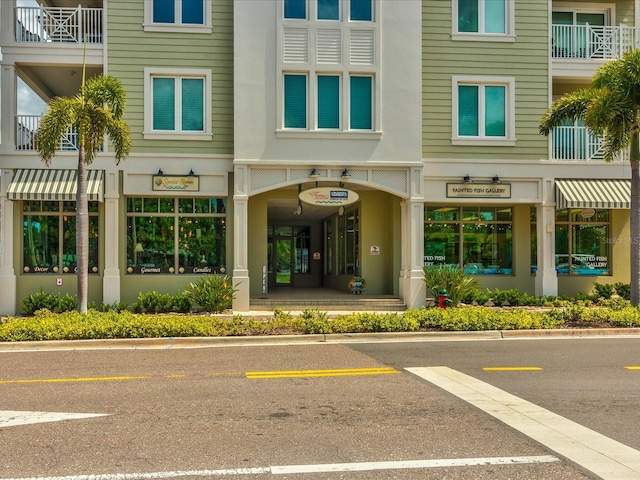 464 N Paula Dr Unit 106, Dunedin, FL 34698 - doorway to property with uncovered parking