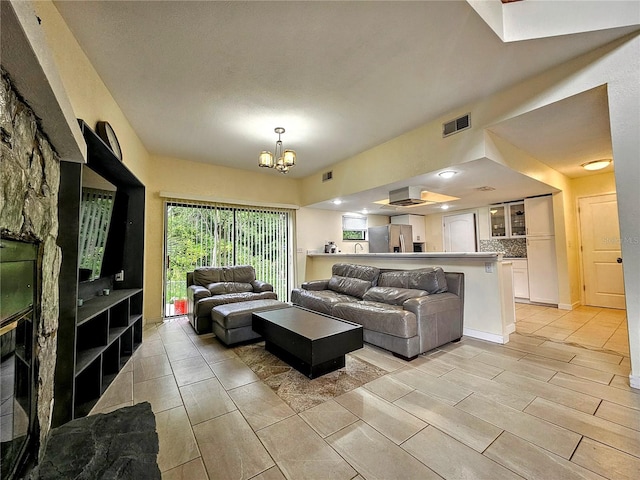 10928 Echo Loop, New Port Richey, FL 34654 - living area featuring a chandelier