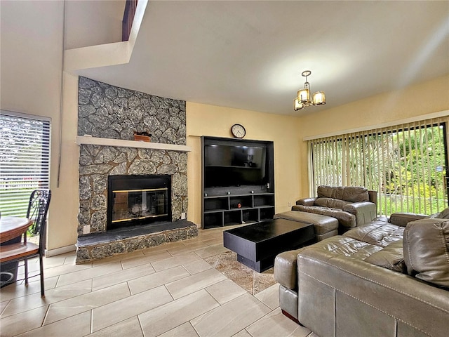 10928 Echo Loop, New Port Richey, FL 34654 - living area with a chandelier, a fireplace, and tile patterned floors