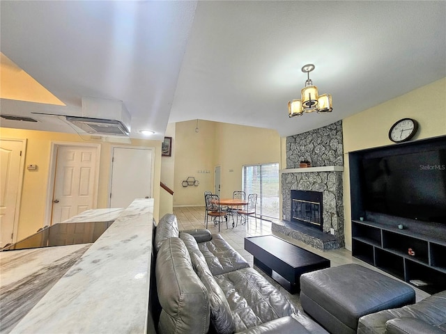 10928 Echo Loop, New Port Richey, FL 34654 - living room featuring a chandelier, a stone fireplace, and vaulted ceiling
