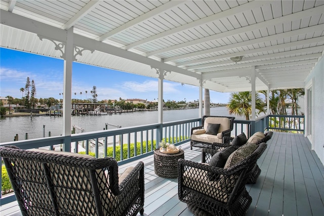 131 N Tessier Dr, St Pete Beach, FL 33706 - deck featuring a water view, boat lift, and a boat dock