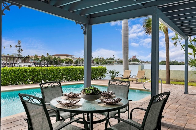 131 N Tessier Dr, St Pete Beach, FL 33706 - view of patio featuring a water view