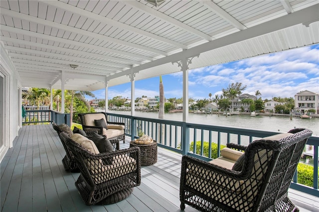 131 N Tessier Dr, St Pete Beach, FL 33706 - wooden deck featuring a water view