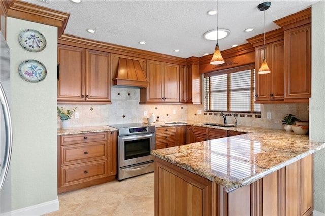 131 N Tessier Dr, St Pete Beach, FL 33706 - kitchen with stainless steel range with electric stovetop, custom exhaust hood, brown cabinets, a peninsula, and light stone counters