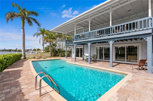 131 N Tessier Dr, St Pete Beach, FL 33706 - outdoor pool featuring a patio area and a water view