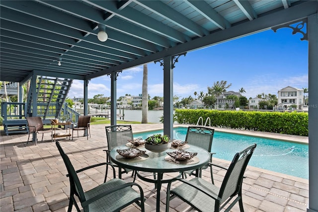 131 N Tessier Dr, St Pete Beach, FL 33706 - view of patio / terrace featuring an outdoor pool