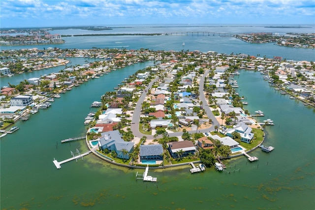 131 N Tessier Dr, St Pete Beach, FL 33706 - aerial view of residential area with a nearby body of water