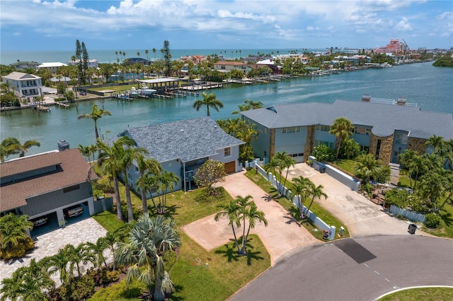 131 N Tessier Dr, St Pete Beach, FL 33706 - aerial view of residential area with a large body of water