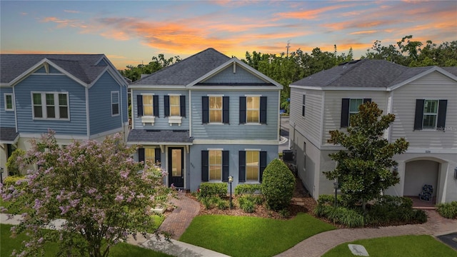 527 Jetstar Ln, Oldsmar, FL 34677 - view of front of house featuring roof with shingles