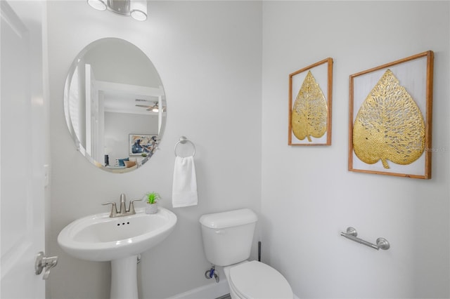 527 Jetstar Ln, Oldsmar, FL 34677 - bathroom with toilet and a ceiling fan