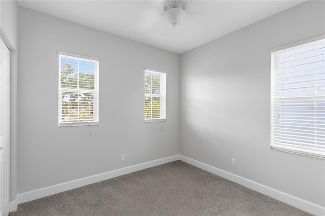 527 Jetstar Ln, Oldsmar, FL 34677 - carpeted spare room featuring baseboards