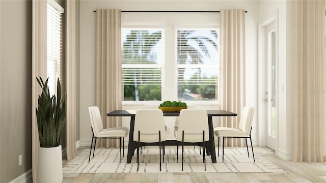 6913 116th Ct E, Palmetto, FL 34221 - dining room featuring baseboards and wood finished floors
