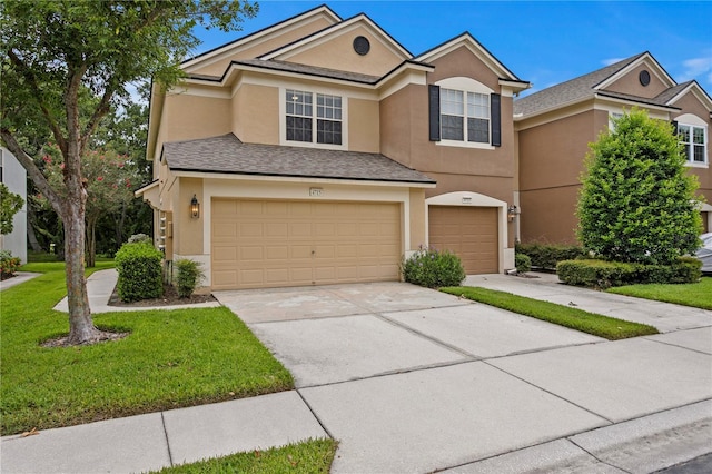 4715 Barnstead Dr, Riverview, FL 33578 - view of front facade featuring stucco siding, an attached garage, concrete driveway, and a front yard