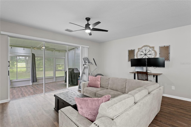 4715 Barnstead Dr, Riverview, FL 33578 - living area featuring ceiling fan and dark wood-style floors