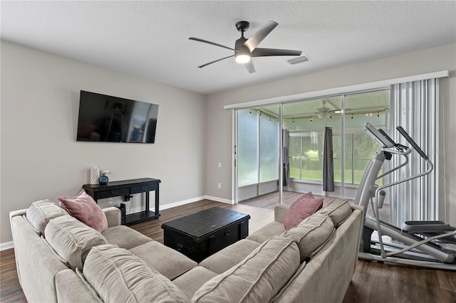 4715 Barnstead Dr, Riverview, FL 33578 - living area featuring a ceiling fan, wood finished floors, and a textured ceiling