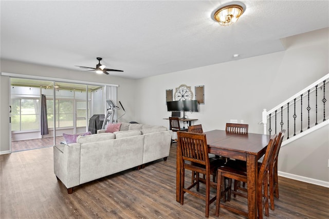 4715 Barnstead Dr, Riverview, FL 33578 - dining room with ceiling fan, dark wood-type flooring, and stairs