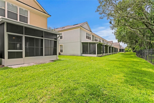 4715 Barnstead Dr, Riverview, FL 33578 - rear view of property featuring a sunroom and stucco siding