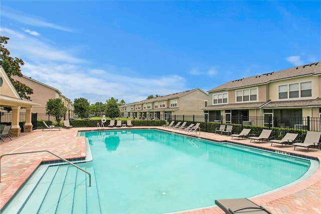 4715 Barnstead Dr, Riverview, FL 33578 - community pool featuring a patio and a residential view