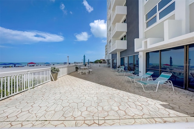 17408 Gulf Blvd Unit 601, Redington Shores, FL 33708 - view of patio featuring a water view