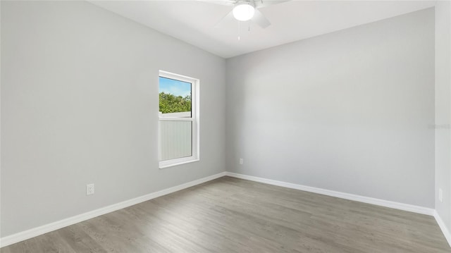 3051 27th Ct E, Palmetto, FL 34221 - empty room with ceiling fan and light wood-style flooring