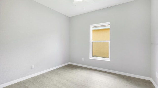 3051 27th Ct E, Palmetto, FL 34221 - empty room with light wood-type flooring and ceiling fan