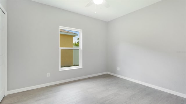 3051 27th Ct E, Palmetto, FL 34221 - unfurnished room with a ceiling fan and wood finished floors