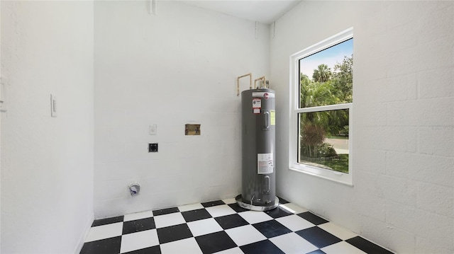 3051 27th Ct E, Palmetto, FL 34221 - laundry area with hookup for an electric dryer, tile patterned floors, electric water heater, and hookup for a washing machine