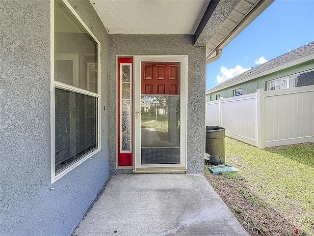 1741 Oak Spring Dr, Tarpon Springs, FL 34689 - property entrance with stucco siding