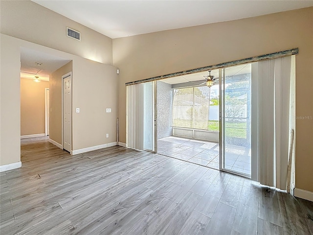 1741 Oak Spring Dr, Tarpon Springs, FL 34689 - spare room with wood finished floors and a ceiling fan