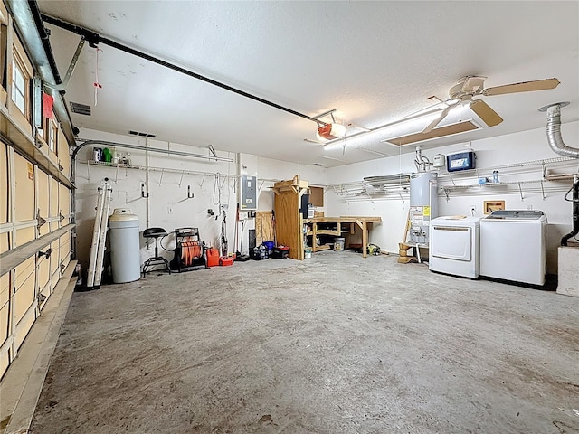 1741 Oak Spring Dr, Tarpon Springs, FL 34689 - garage featuring washing machine and dryer, a garage door opener, water heater, electric panel, and ceiling fan