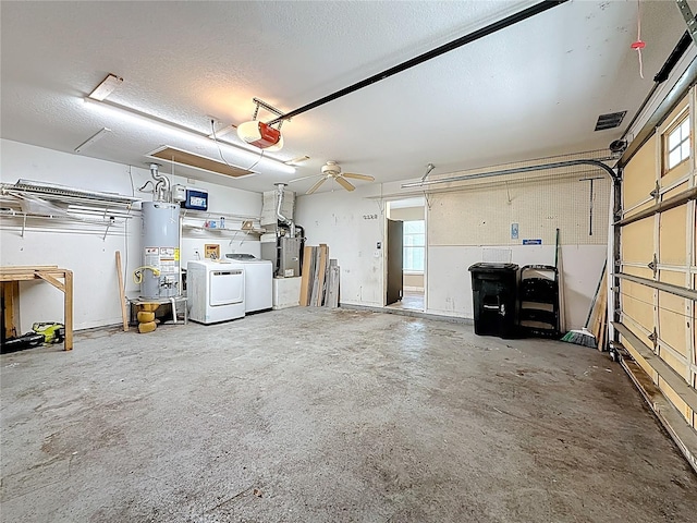 1741 Oak Spring Dr, Tarpon Springs, FL 34689 - garage featuring washer and clothes dryer, a garage door opener, gas water heater, and heating unit