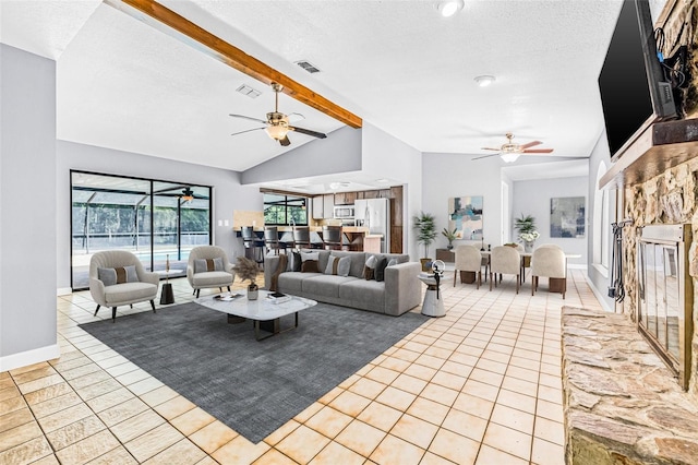 10430 Bobcat Dr, New Port Richey, FL 34654 - living room with ceiling fan, light tile patterned floors, and a textured ceiling