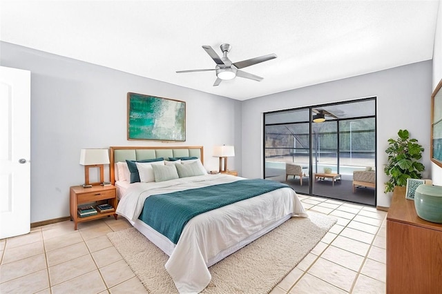 10430 Bobcat Dr, New Port Richey, FL 34654 - bedroom with light tile patterned floors, access to outside, and a ceiling fan