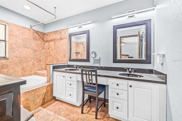 10430 Bobcat Dr, New Port Richey, FL 34654 - full bath with double vanity and tiled shower / bath combo