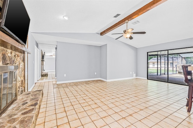 10430 Bobcat Dr, New Port Richey, FL 34654 - unfurnished living room with light tile patterned floors, a ceiling fan, and a glass covered fireplace