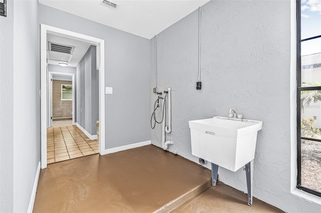 10430 Bobcat Dr, New Port Richey, FL 34654 - washroom with hookup for a washing machine and baseboards