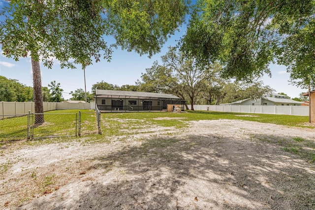 10430 Bobcat Dr, New Port Richey, FL 34654 - view of yard featuring a gate