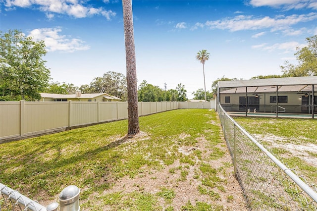 10430 Bobcat Dr, New Port Richey, FL 34654 - fenced backyard with glass enclosure