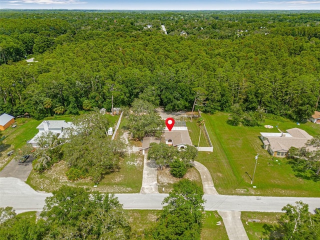 10430 Bobcat Dr, New Port Richey, FL 34654 - aerial view of property and surrounding area featuring a forest