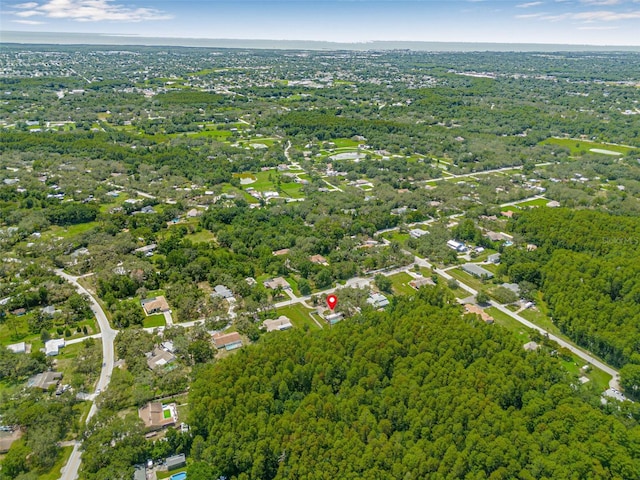 10430 Bobcat Dr, New Port Richey, FL 34654 - aerial view of property and surrounding area with a heavily wooded area