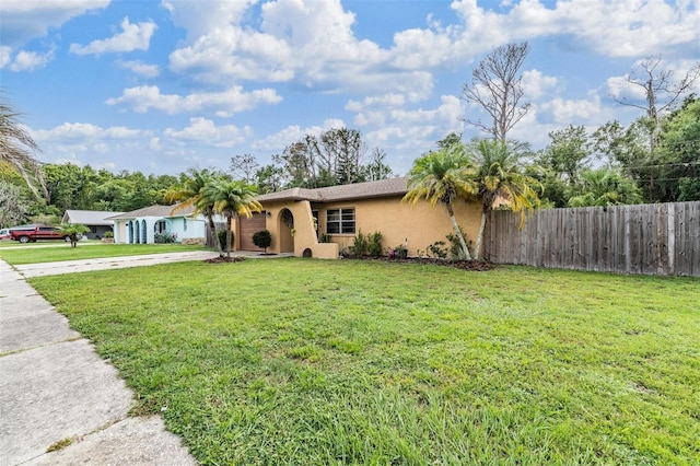 6101 Broken Arrow Dr, New Port Richey, FL 34653 - ranch-style home with stucco siding and concrete driveway