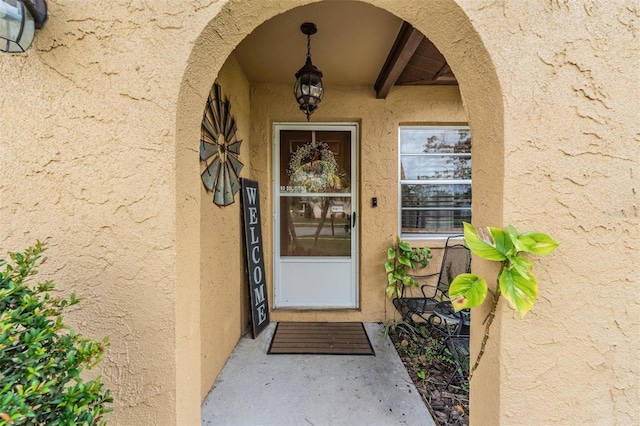 6101 Broken Arrow Dr, New Port Richey, FL 34653 - entrance to property with stucco siding