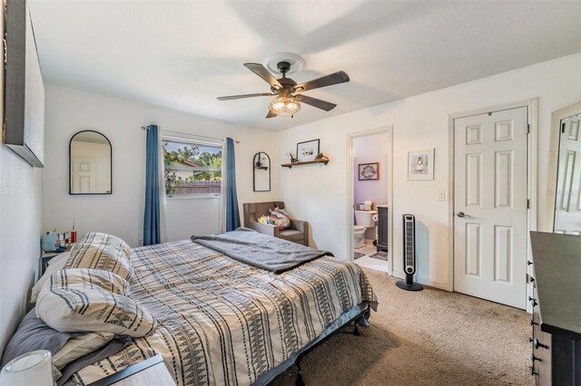 6101 Broken Arrow Dr, New Port Richey, FL 34653 - bedroom featuring light colored carpet, a ceiling fan, and ensuite bath