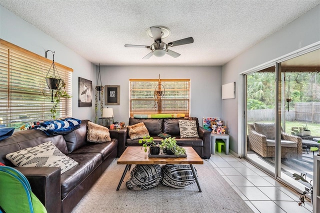 6101 Broken Arrow Dr, New Port Richey, FL 34653 - living area featuring ceiling fan, a textured ceiling, and tile patterned floors
