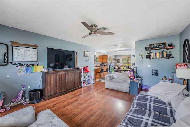 6101 Broken Arrow Dr, New Port Richey, FL 34653 - living room featuring a ceiling fan and light wood-style floors